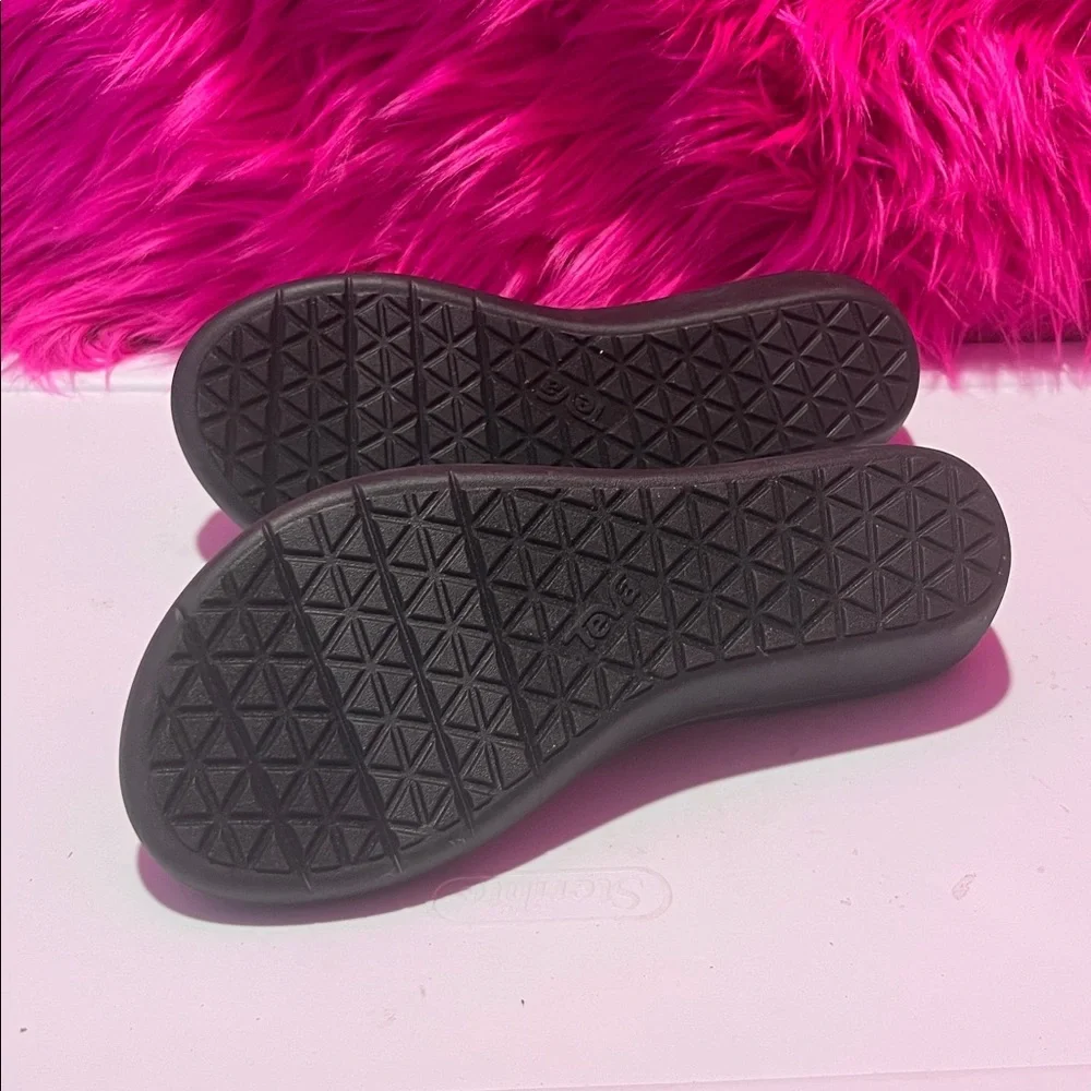 Teva Black Flip Flops with White Patterned Straps